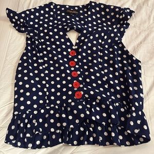 Trashy diva blue and white polka dot blouse with red buttons. Size 14